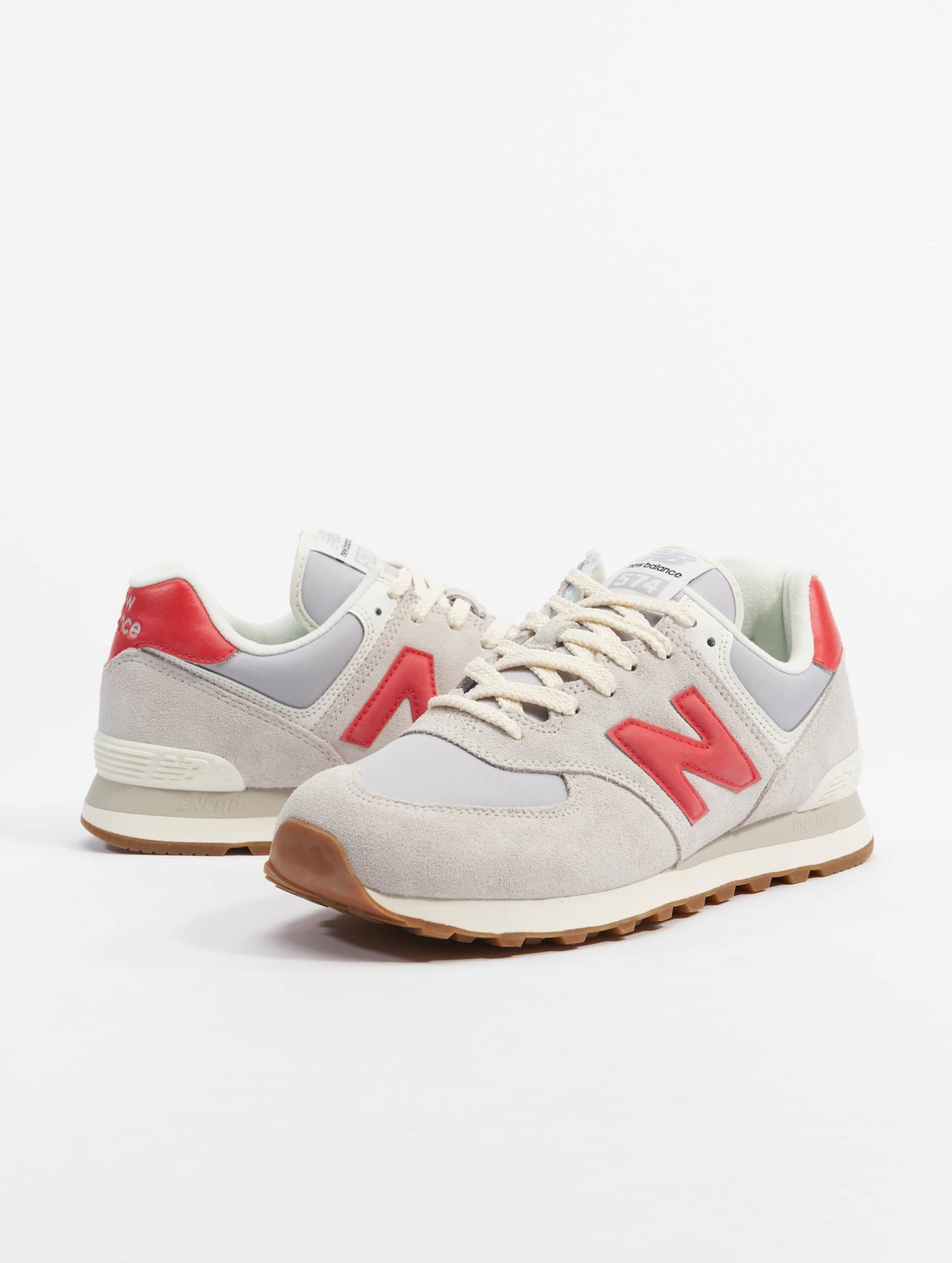 New Balance 574 Schuhe Frauen,Männer,Unisex op kleur grijs, Maat 43